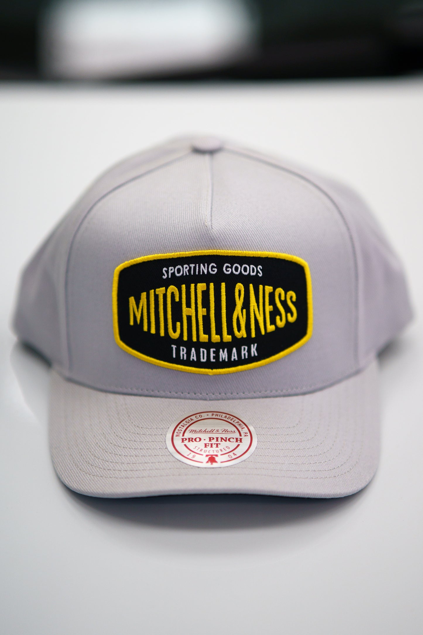 Mitchell & Ness Keps - Own Brand Grey/Yellow Sporting Trucker - Patch